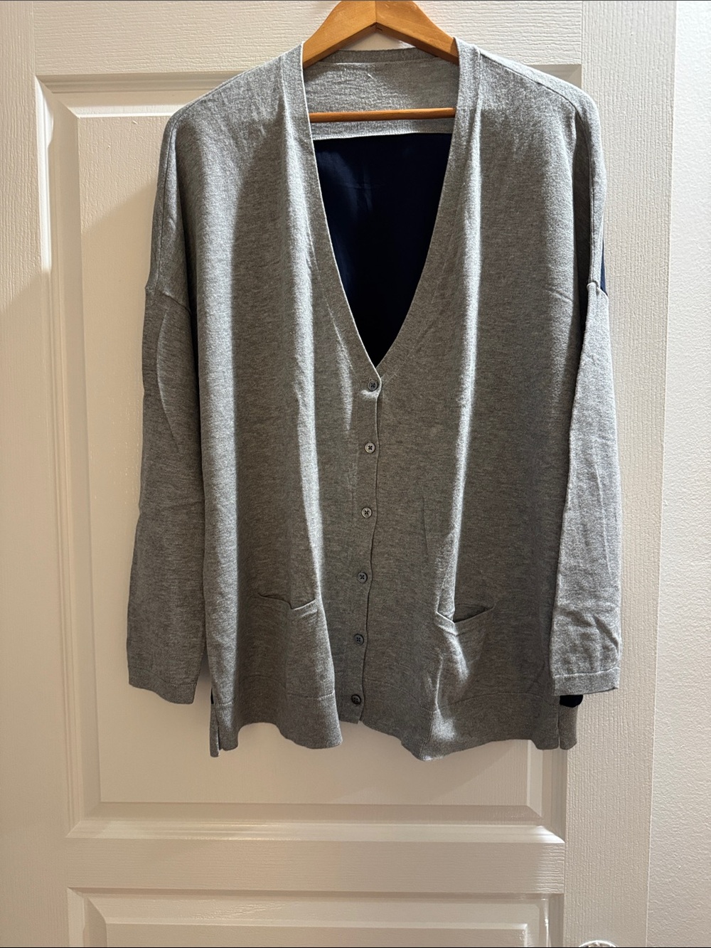Womans Lightweight Gray V-Neck Button Cardigan Sweater
Soft blue, silky back fab